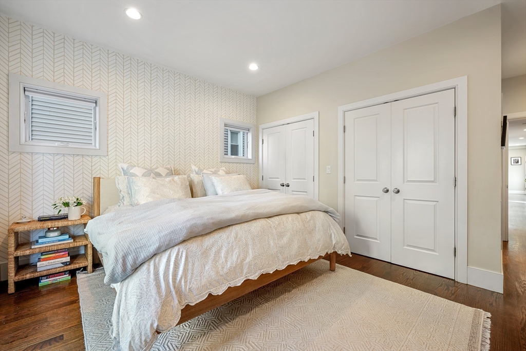 861 East 2nd Street, Unit 1 Boston, MA 02127 - Photo 15 of 30 a spacious bedroom with a bed and a window