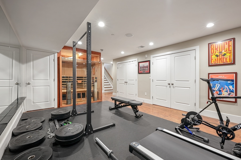861 East 2nd Street, Unit 1 Boston, MA 02127 - Photo 21 of 30 a room with gym equipment and windows