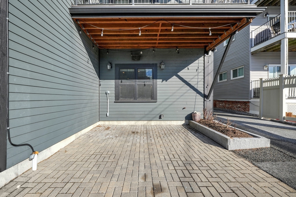 861 East 2nd Street, Unit 1 Boston, MA 02127 - Photo 27 of 30 a backyard of a house