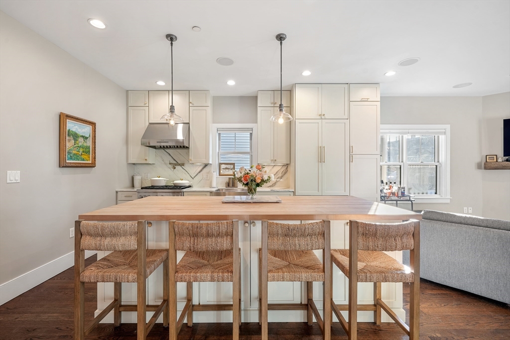 861 East 2nd Street, Unit 1 Boston, MA 02127 - Photo 3 of 30 a large kitchen with a table and chairs