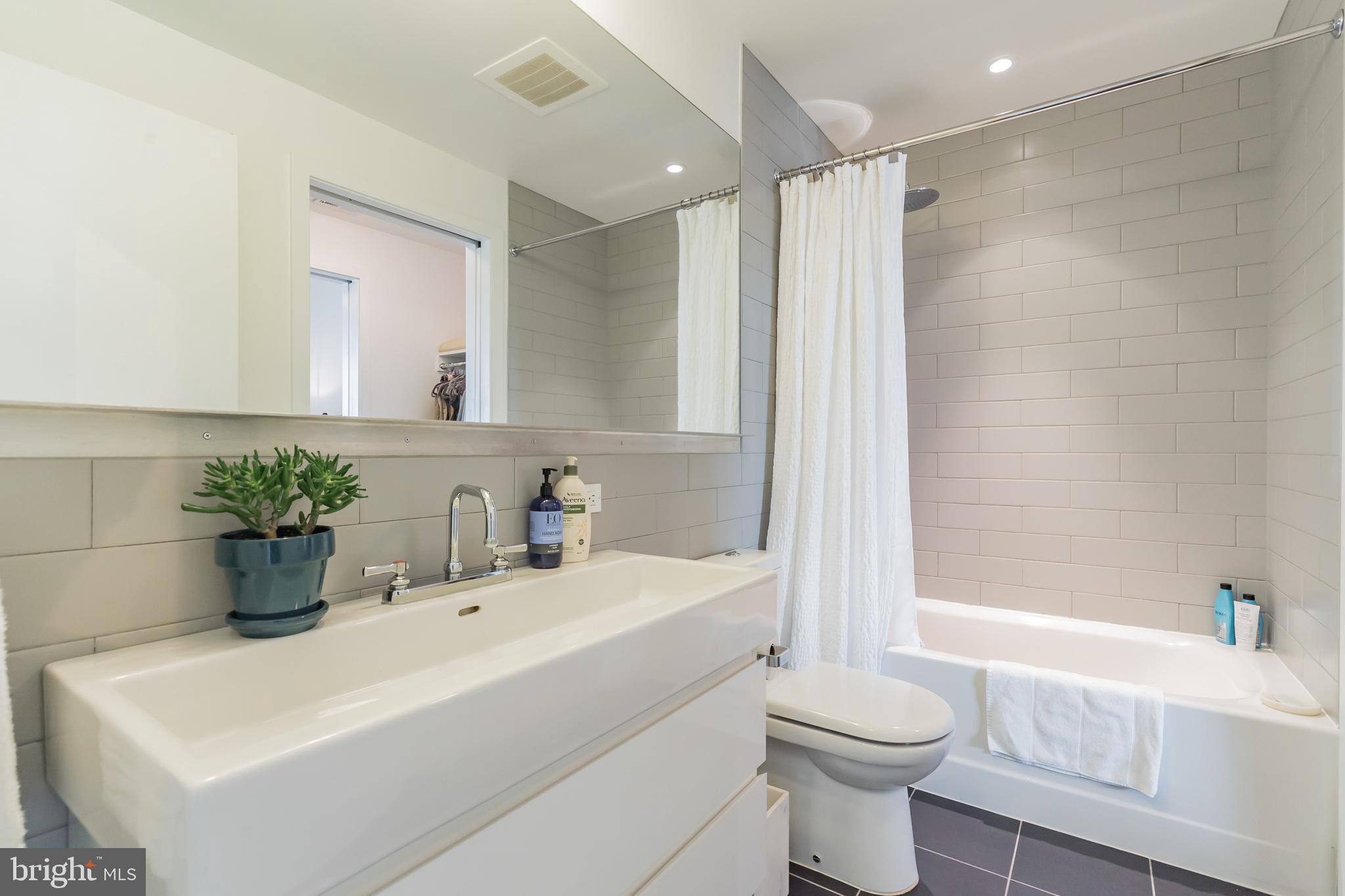 2030 8th Street Northwest, Unit 410 Washington, DC 20001 - Photo 19 of 30 Spa-like bath with oversized sink.