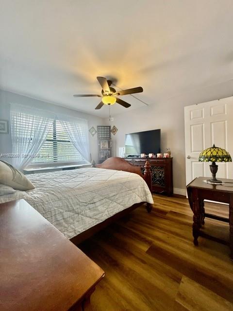 2981 North Nob Hill Road, Unit 306 Sunrise, FL 33322 - Photo 14 of 34 a bed room with a bed and a window