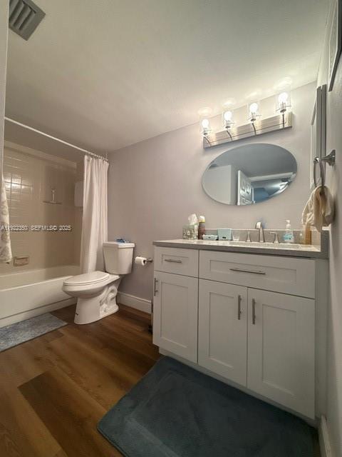 2981 North Nob Hill Road, Unit 306 Sunrise, FL 33322 - Photo 17 of 34 a bathroom with a granite countertop sink toilet and mirror