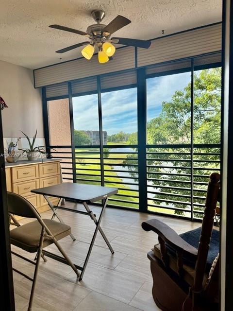 2981 North Nob Hill Road, Unit 306 Sunrise, FL 33322 - Photo 9 of 34 a view of a dining room with furniture window and outside view