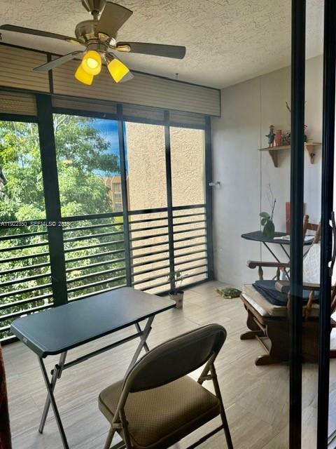 2981 North Nob Hill Road, Unit 306 Sunrise, FL 33322 - Photo 10 of 34 a bedroom with furniture and a window