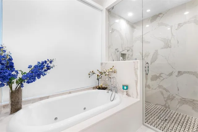 a view of a swimming pool with a patio and a yard