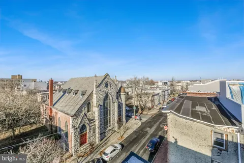 a view of a city with tall buildings