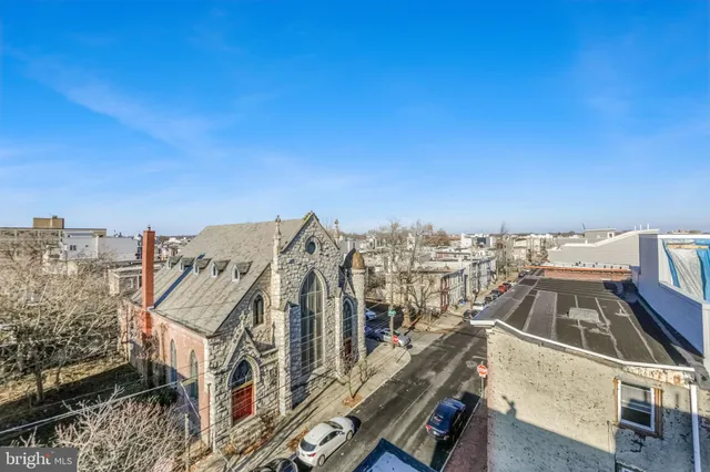 a view of a city with tall buildings