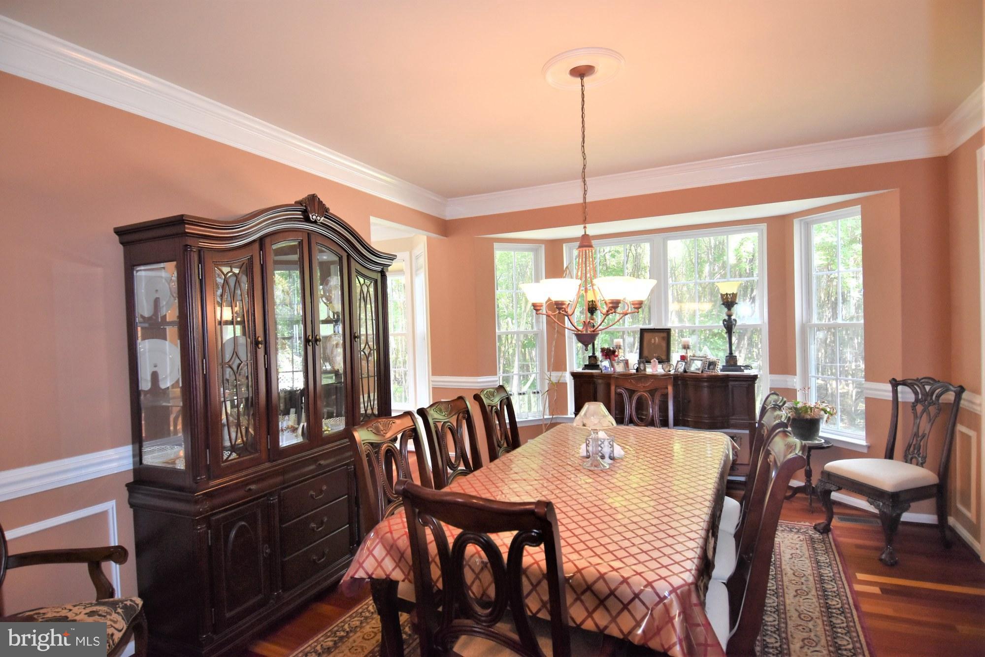 2420 Powderhorn Way Crofton, MD 21114 - Photo 9 of 85 Formal Dining Room Has Bay Window