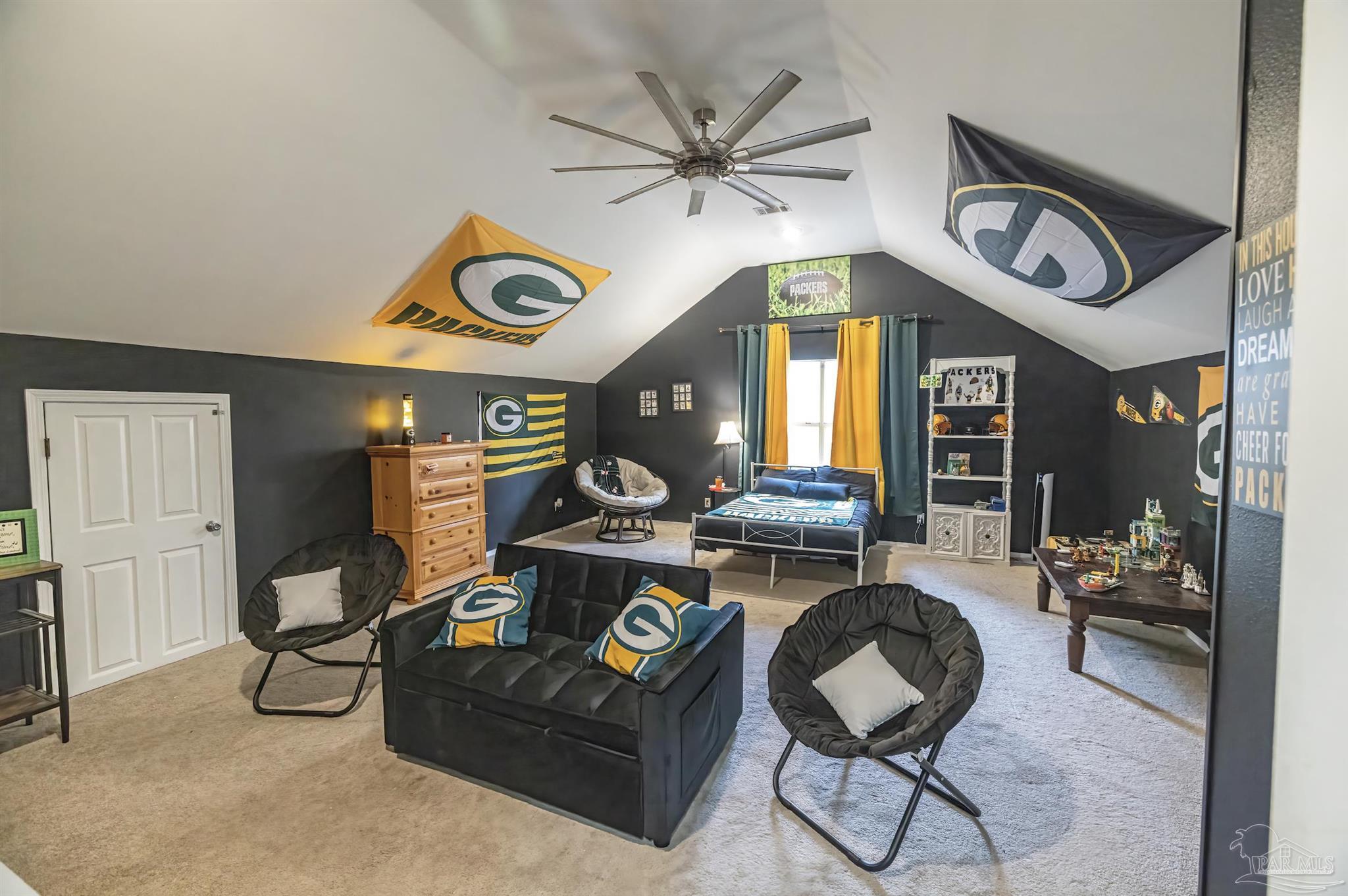 5013 Roland Road Pace, FL 32571 - Photo 12 of 30 a living room with furniture and a clock