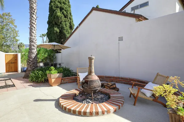 a vase of flowers sitting on a table