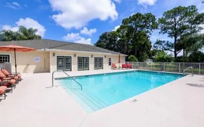 a view of a house with swimming pool