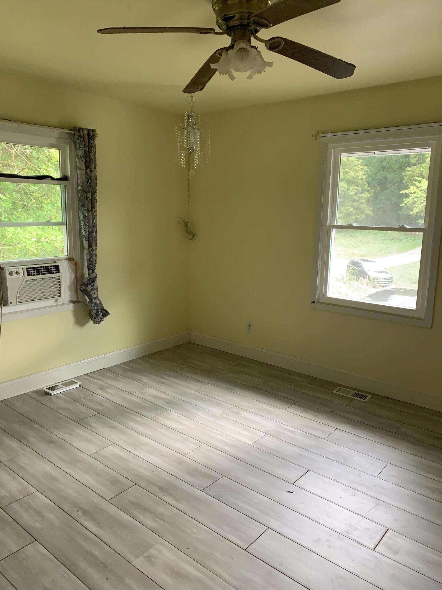 48 East Division Road Valparaiso, IN 46383 - Photo 10 of 13 a view of an empty room with a window