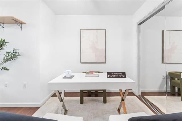 a view of a workspace with furniture