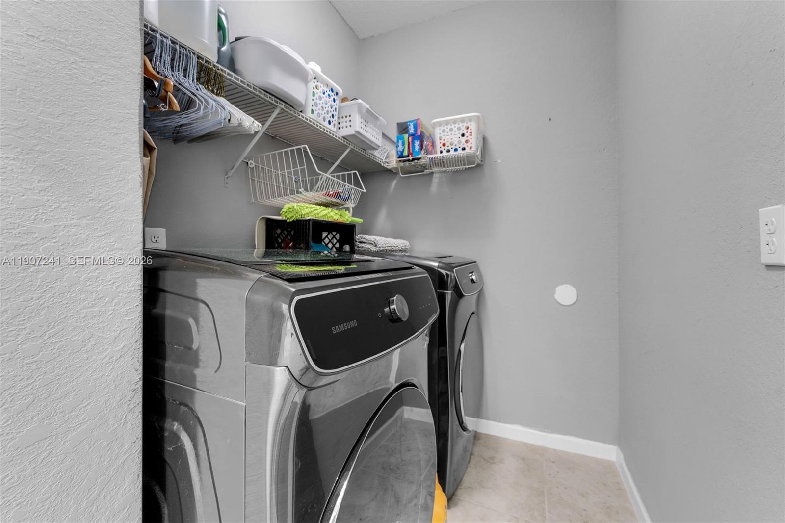 13240 Southwest 274th Street Homestead, FL 33032 - Photo 27 of 54 a utility room with dryer and washer