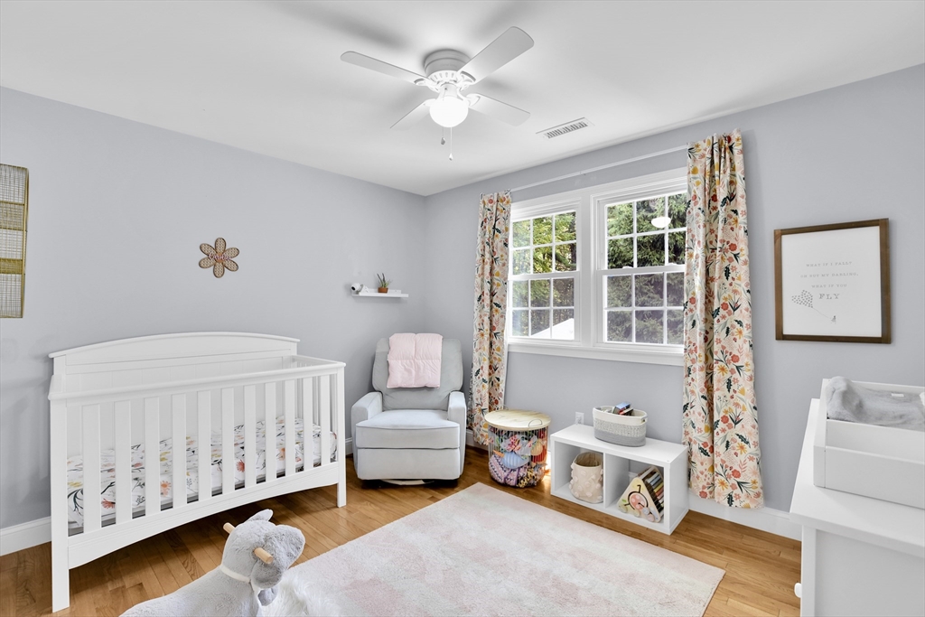 503 South Meadow Road Lancaster, MA 01523 - Photo 11 of 26 a bedroom with furniture and a large window