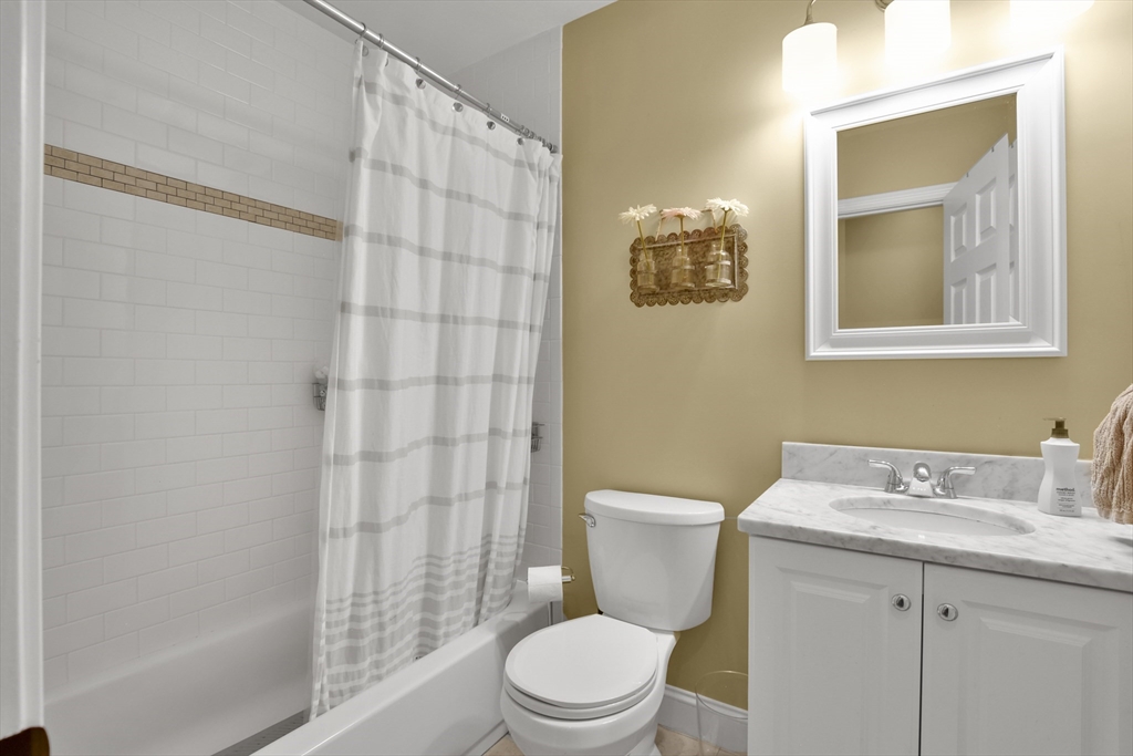 503 South Meadow Road Lancaster, MA 01523 - Photo 13 of 26 a bathroom with a sink a toilet and shower