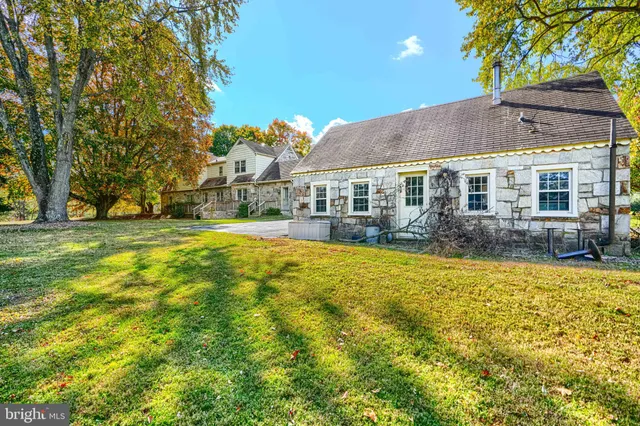 a view of outdoor space with trees all around