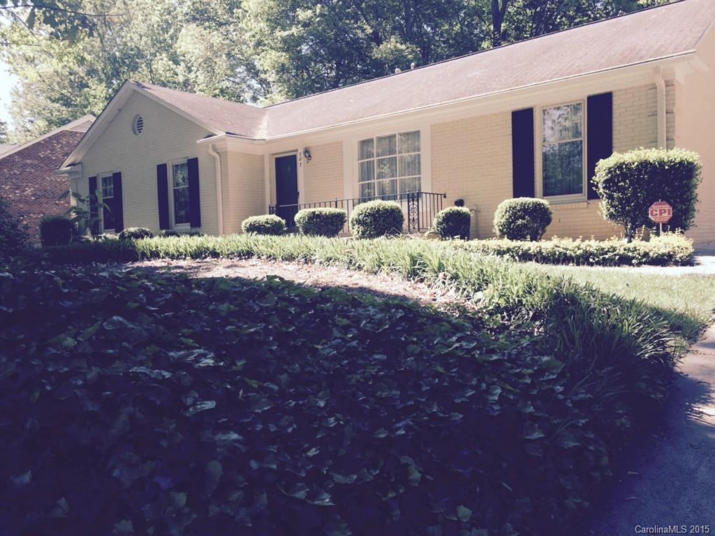 707 Trail Ridge Road Matthews, NC 28105 - Photo 1 of 9 a front view of a house with garden