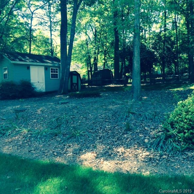 707 Trail Ridge Road Matthews, NC 28105 - Photo 6 of 9 a view of a yard with a house in the background
