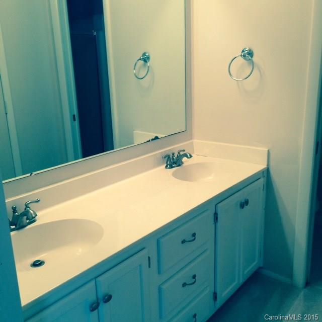 707 Trail Ridge Road Matthews, NC 28105 - Photo 7 of 9 a bathroom with a sink and mirror