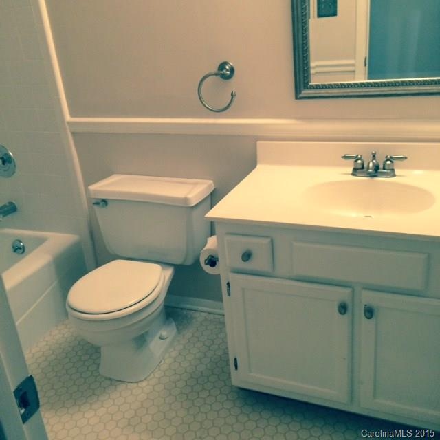 707 Trail Ridge Road Matthews, NC 28105 - Photo 8 of 9 a bathroom with a toilet and a sink