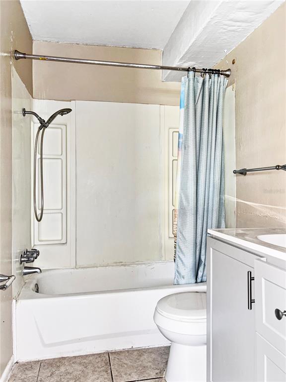 6308 20th Street Zephyrhills, FL 33542 - Photo 18 of 19 a bathroom with a granite countertop sink and a mirror