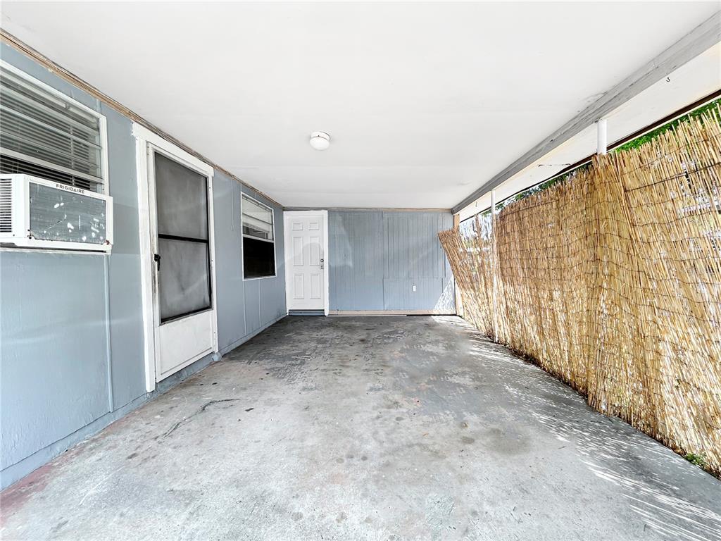 6308 20th Street Zephyrhills, FL 33542 - Photo 10 of 19 a view of an empty room with a window