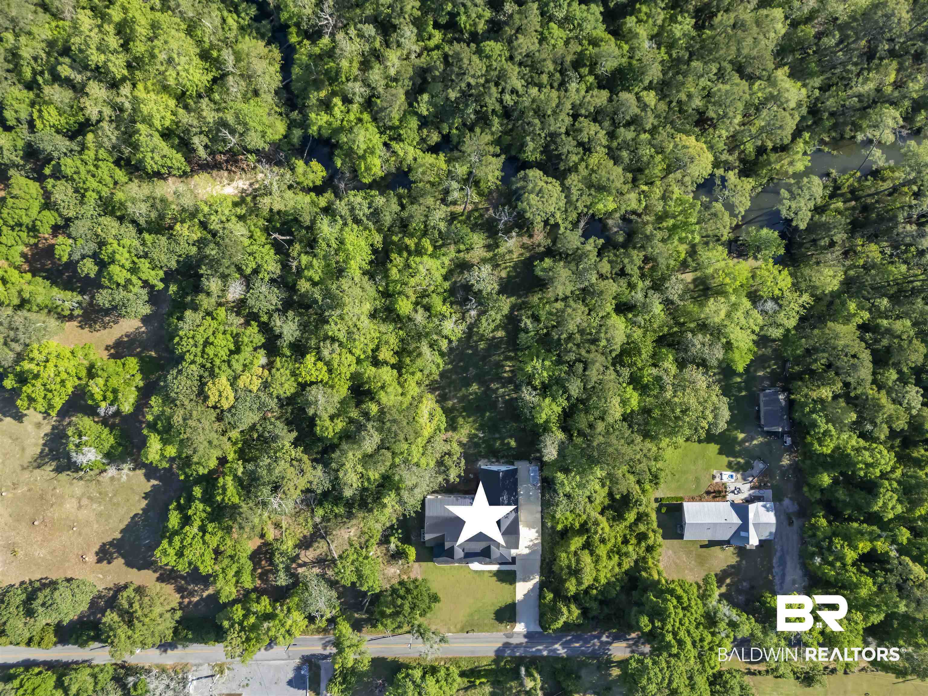 19058 James Road Gulf Shores, AL 36542 - Photo 47 of 49 Aerial view of a forest