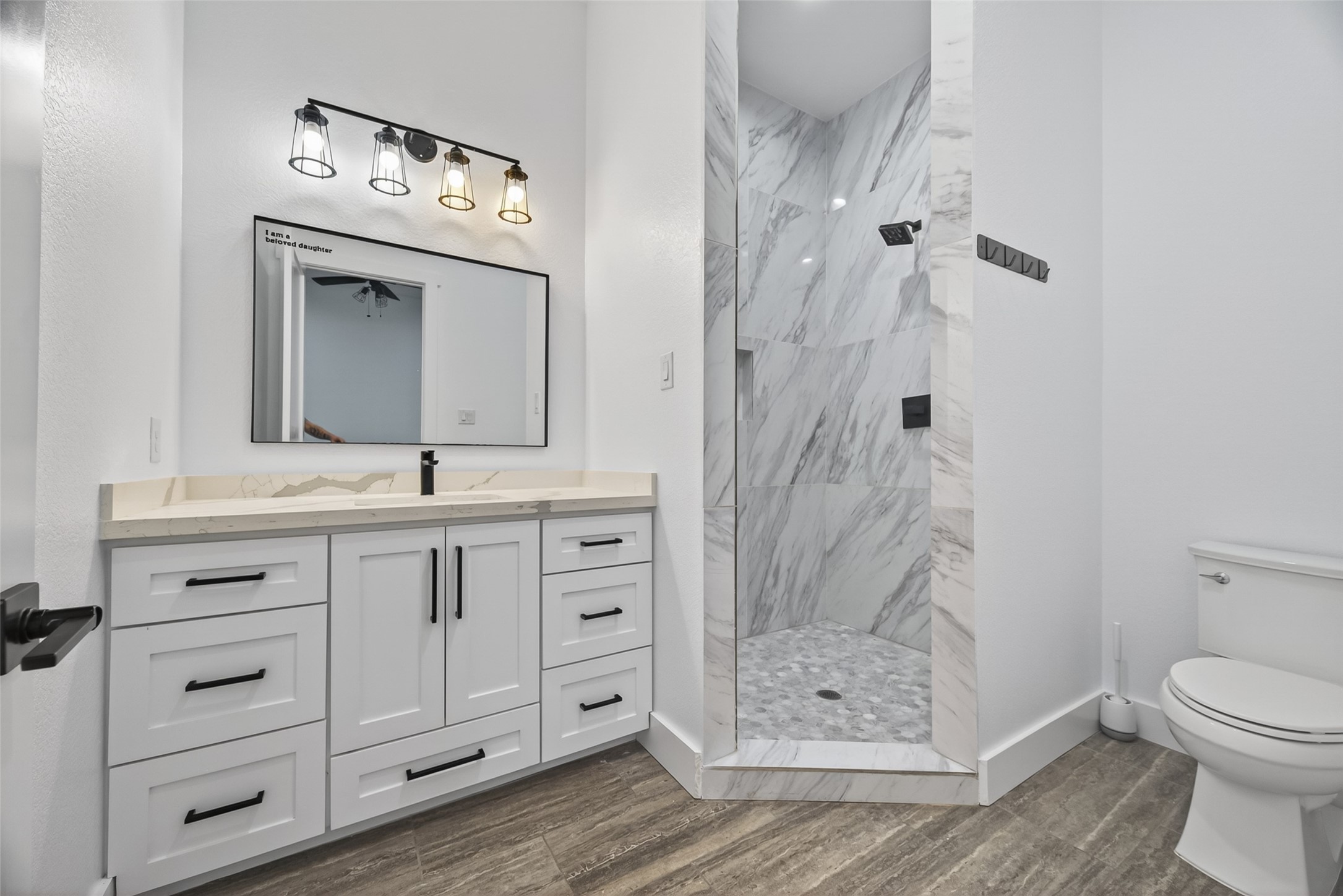 12625 Padon Road Needville, TX 77461 - Photo 29 of 50 Second bathroom in the guest house featuring modern finishes, a spacious walk-in shower, and a sleek vanity for comfort and convenience.