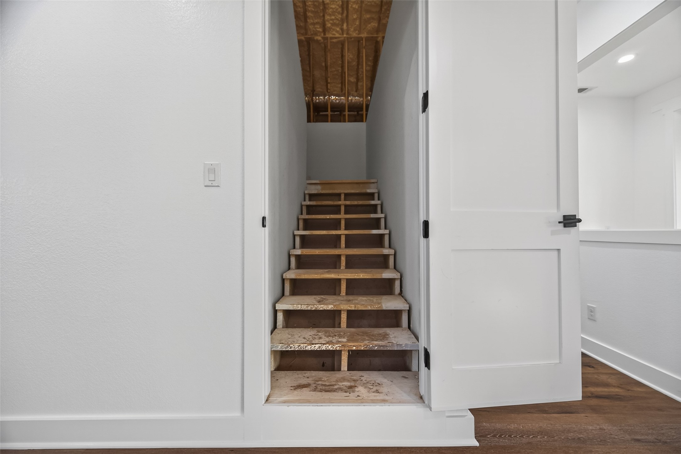 12625 Padon Road Needville, TX 77461 - Photo 31 of 50 staircase leading to Over 2,000 sq ft of floored attic space with staircase access—ideal for storage or future expansion.