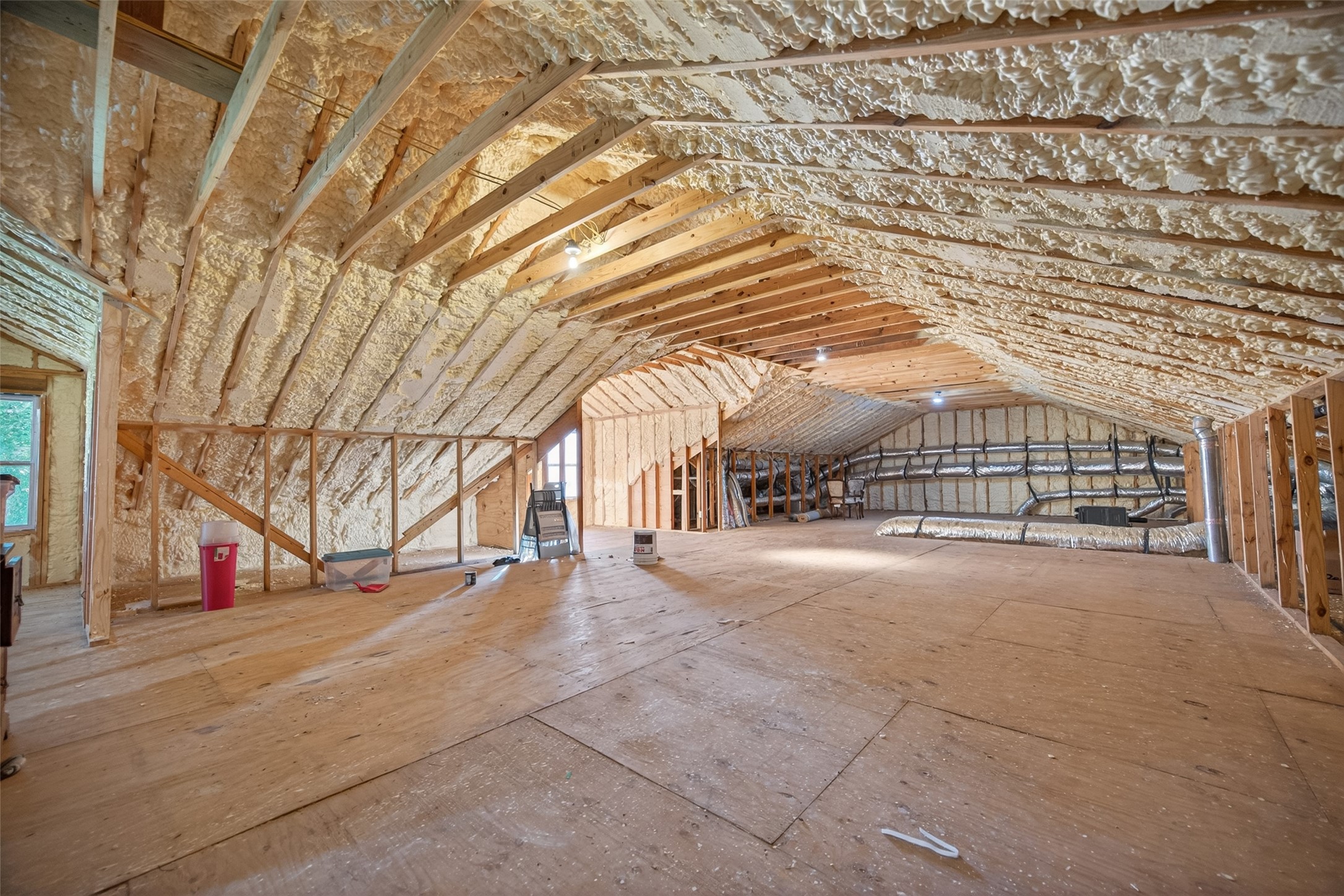 12625 Padon Road Needville, TX 77461 - Photo 32 of 50 Over 2,000 sq ft of floored attic space with staircase access—ideal for storage or future expansion.