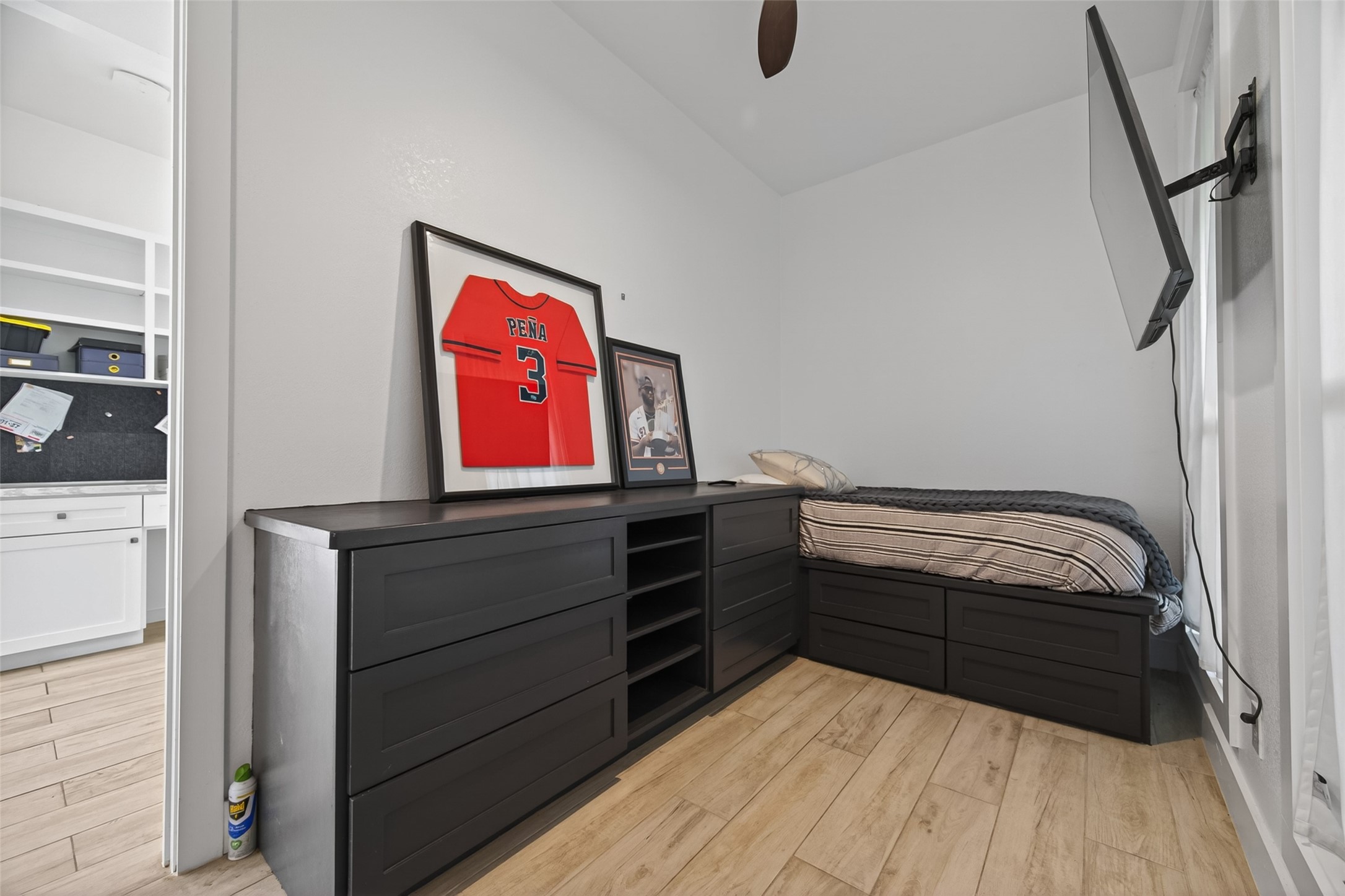12625 Padon Road Needville, TX 77461 - Photo 37 of 50 Second bedroom in the guest house featuring a functional layout with built-in storage, perfect for guests, kids, or a cozy private retreat.