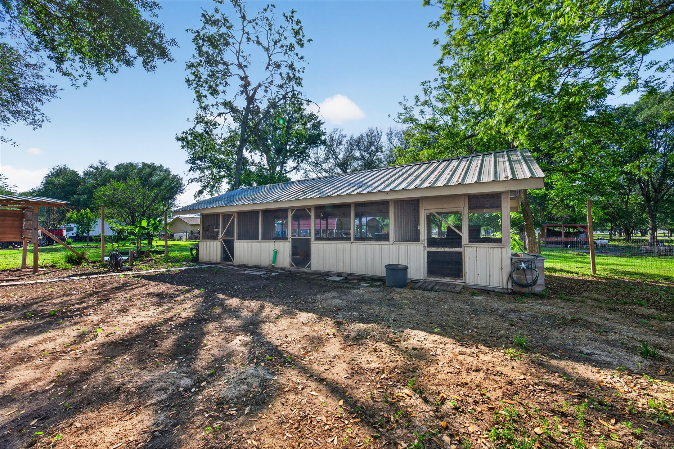 12625 Padon Road Needville, TX 77461 - Photo 45 of 50 Fully equipped coop with electricity, ventilation, water access, and nesting boxes—ideal for hobby farming or 4-H projects.