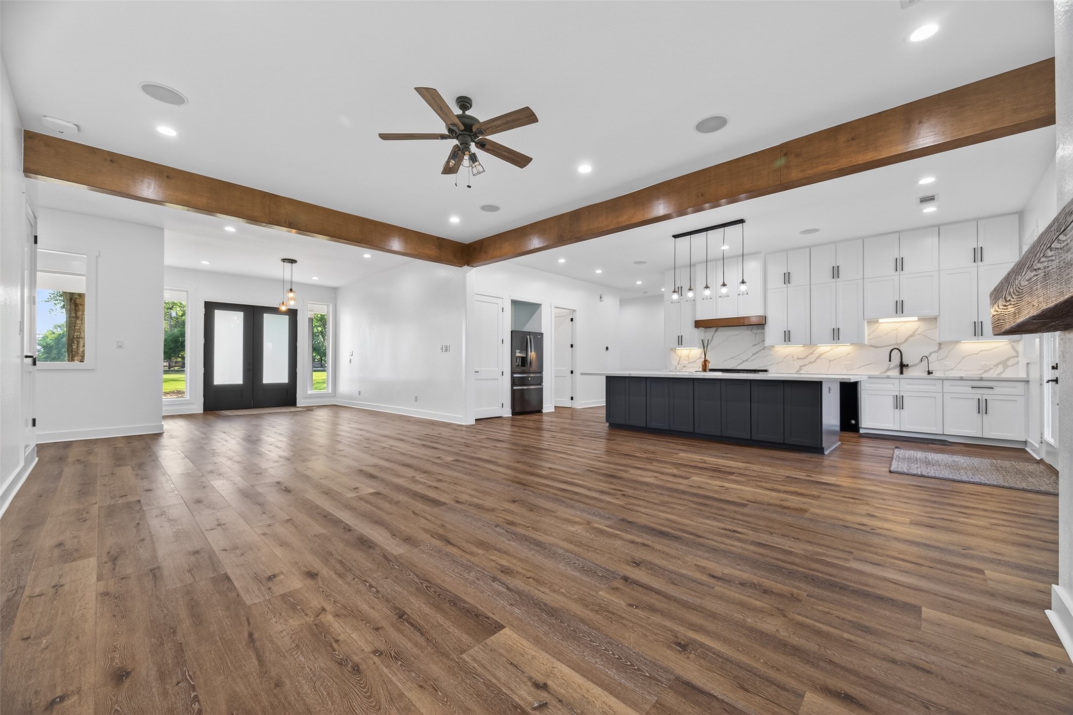 12625 Padon Road Needville, TX 77461 - Photo 8 of 50 Spacious living area designed for comfort, with easy flow into kitchen and entertaining spaces.