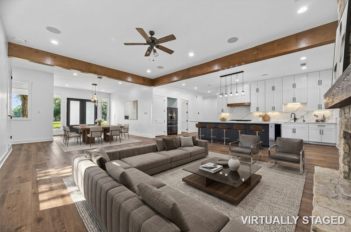 12625 Padon Road Needville, TX 77461 - Photo 9 of 50 cozy dinning and kitchen area with fireplace