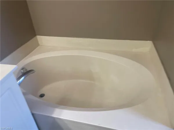 a view of a bathtub in a bathroom