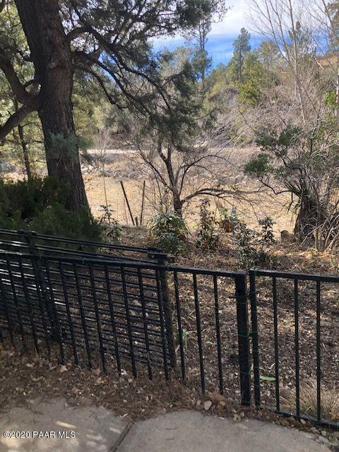 1413 Coyote Road Prescott, AZ 86303 - Photo 14 of 16 Coyote fenced backyard