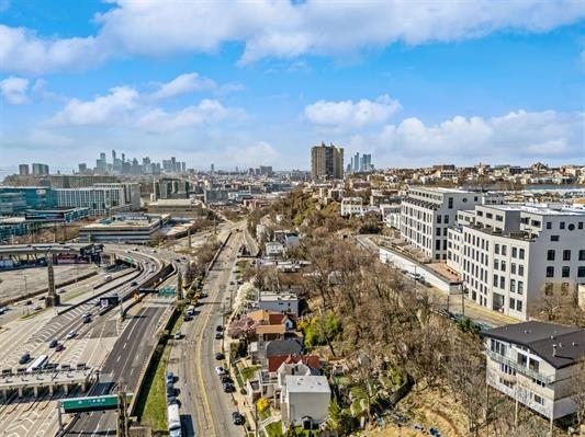 64-70 Hackensack Plank Road Weehawken, NJ 07086 - Photo 13 of 38 an aerial view of a city