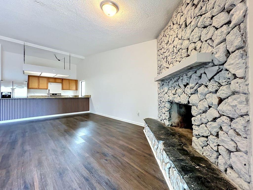 5214 2nd Street Orlando, FL 32810 - Photo 24 of 50 wooden floor in an empty room with a workspace