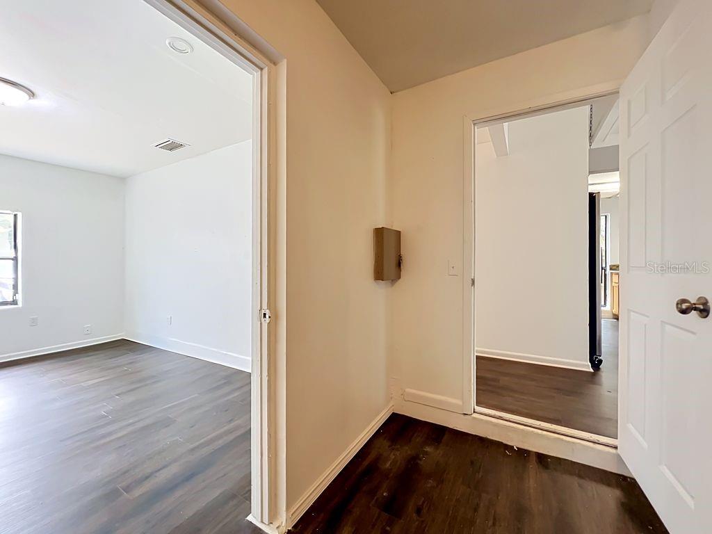 5214 2nd Street Orlando, FL 32810 - Photo 40 of 50 a view of a hallway with wooden floor