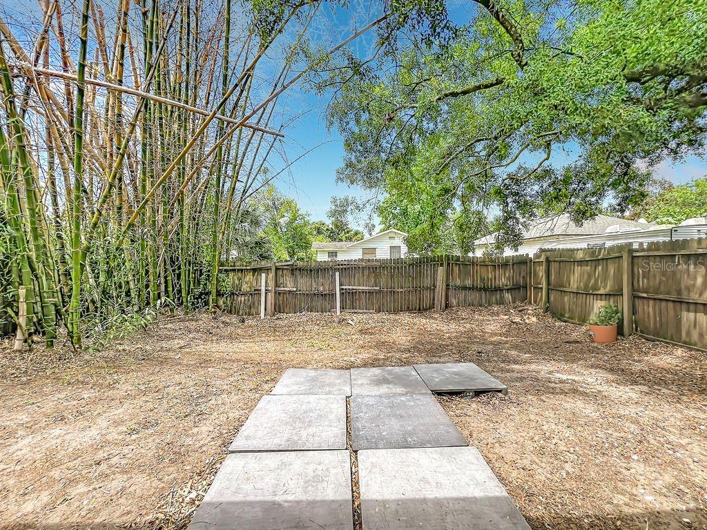 5214 2nd Street Orlando, FL 32810 - Photo 42 of 50 a view of a yard with wooden fence