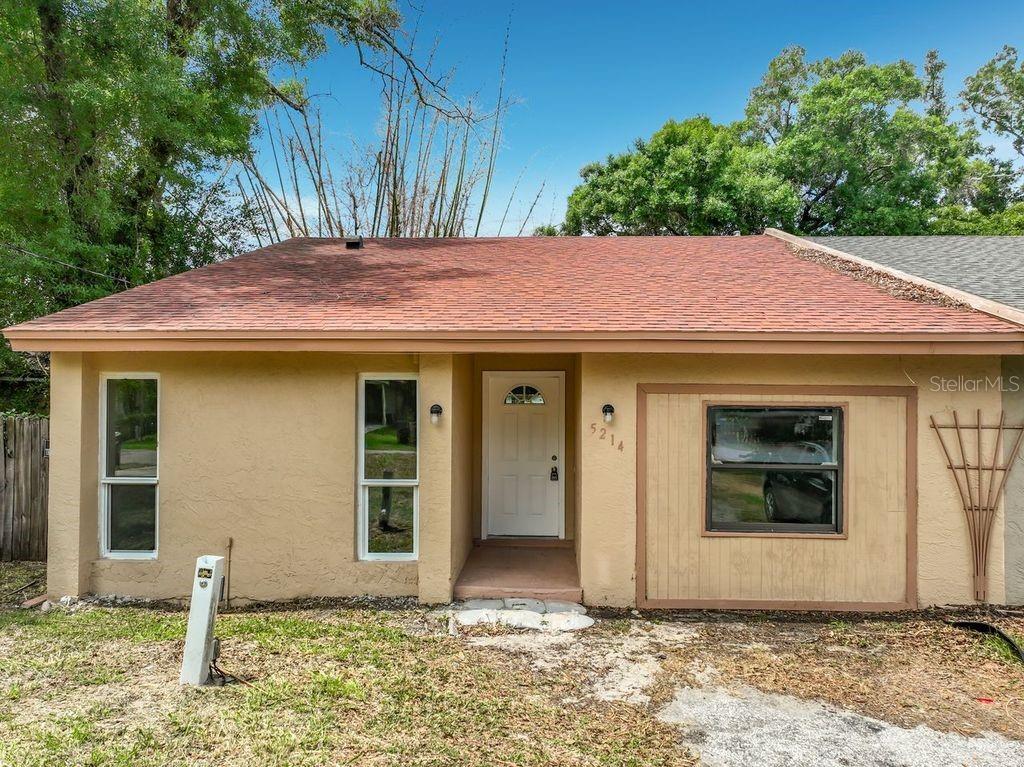 5214 2nd Street Orlando, FL 32810 - Photo 7 of 50 a front view of a house