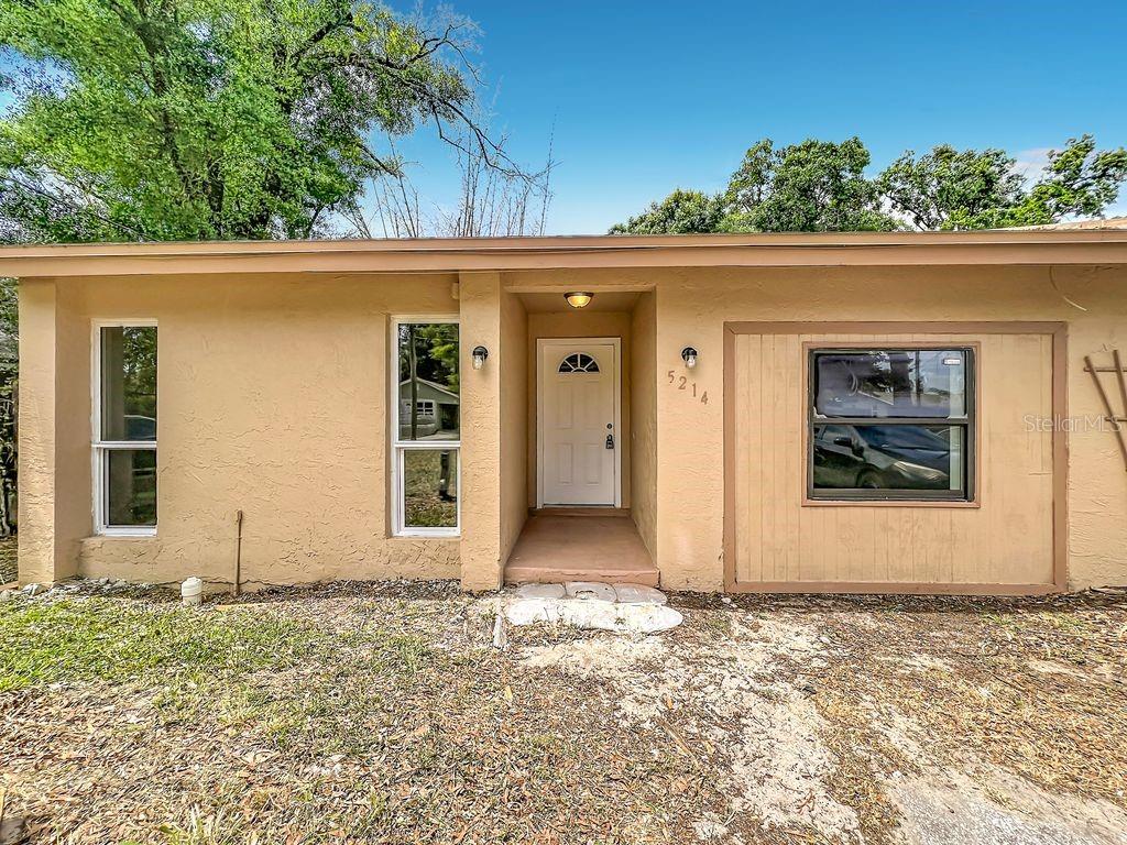 5214 2nd Street Orlando, FL 32810 - Photo 8 of 50 a front view of a house