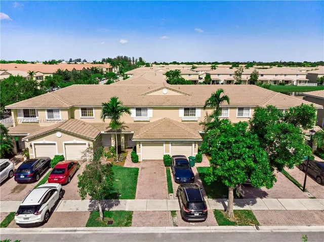 an aerial view of multiple houses