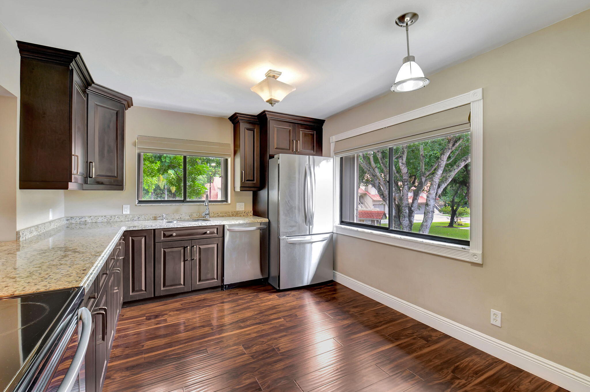 5731 Coach House Circle, Unit D Boca Raton, FL 33486 - Photo 7 of 47 LIGHT AND BRIGHT SUNNY KITCHEN