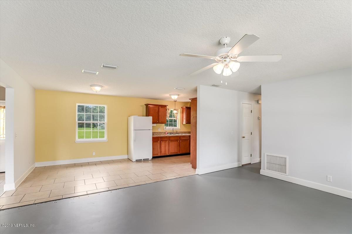 6243 Adams Road Macclenny, FL 32063 - Photo 5 of 18 04-Living Room to Kitchen