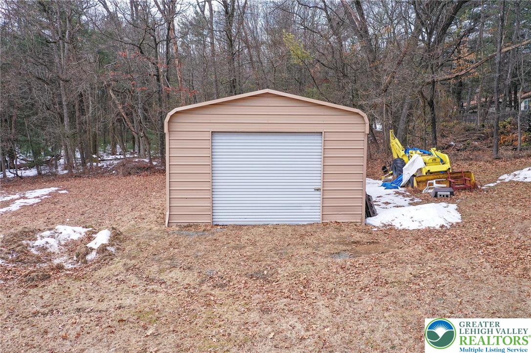 1115 Smithlane Road Lehighton, PA 18235 - Photo 15 of 24 a front view of a house with a yard