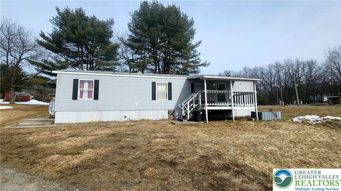 1115 Smithlane Road Lehighton, PA 18235 - Photo 16 of 24 a view of a house with a yard