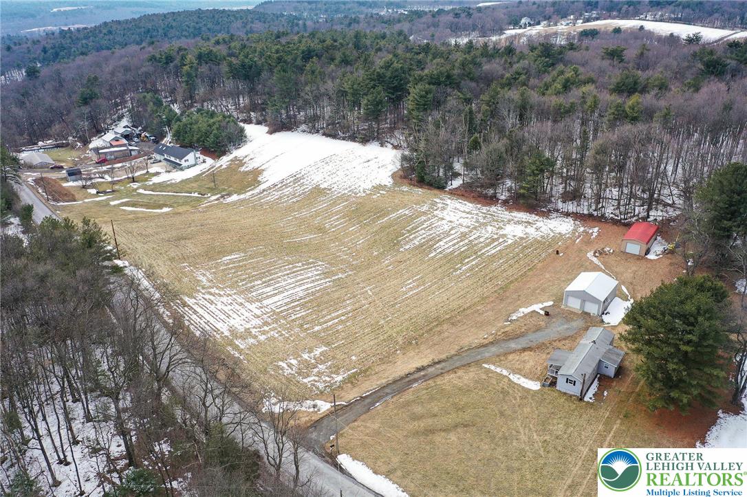 1115 Smithlane Road Lehighton, PA 18235 - Photo 4 of 24 a view of a yard with a fountain
